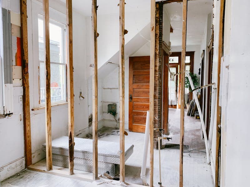 Exposed wood framing during home reconstruction